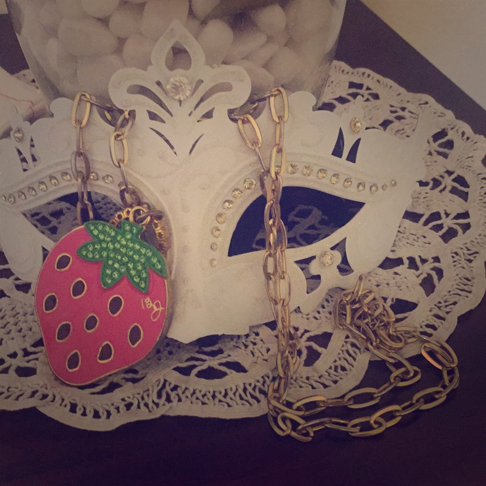 Betsy Johnson strawberry necklace, mirror on back